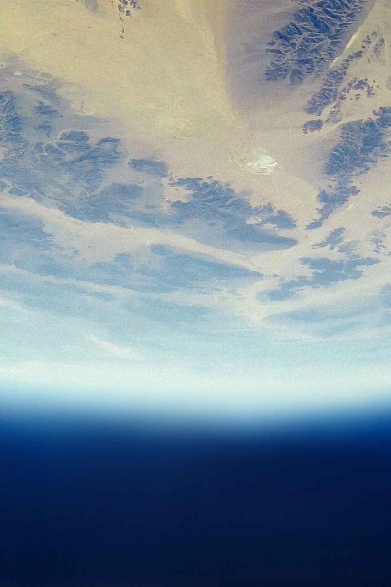 Earth's horizon and cloud formations viewed from space