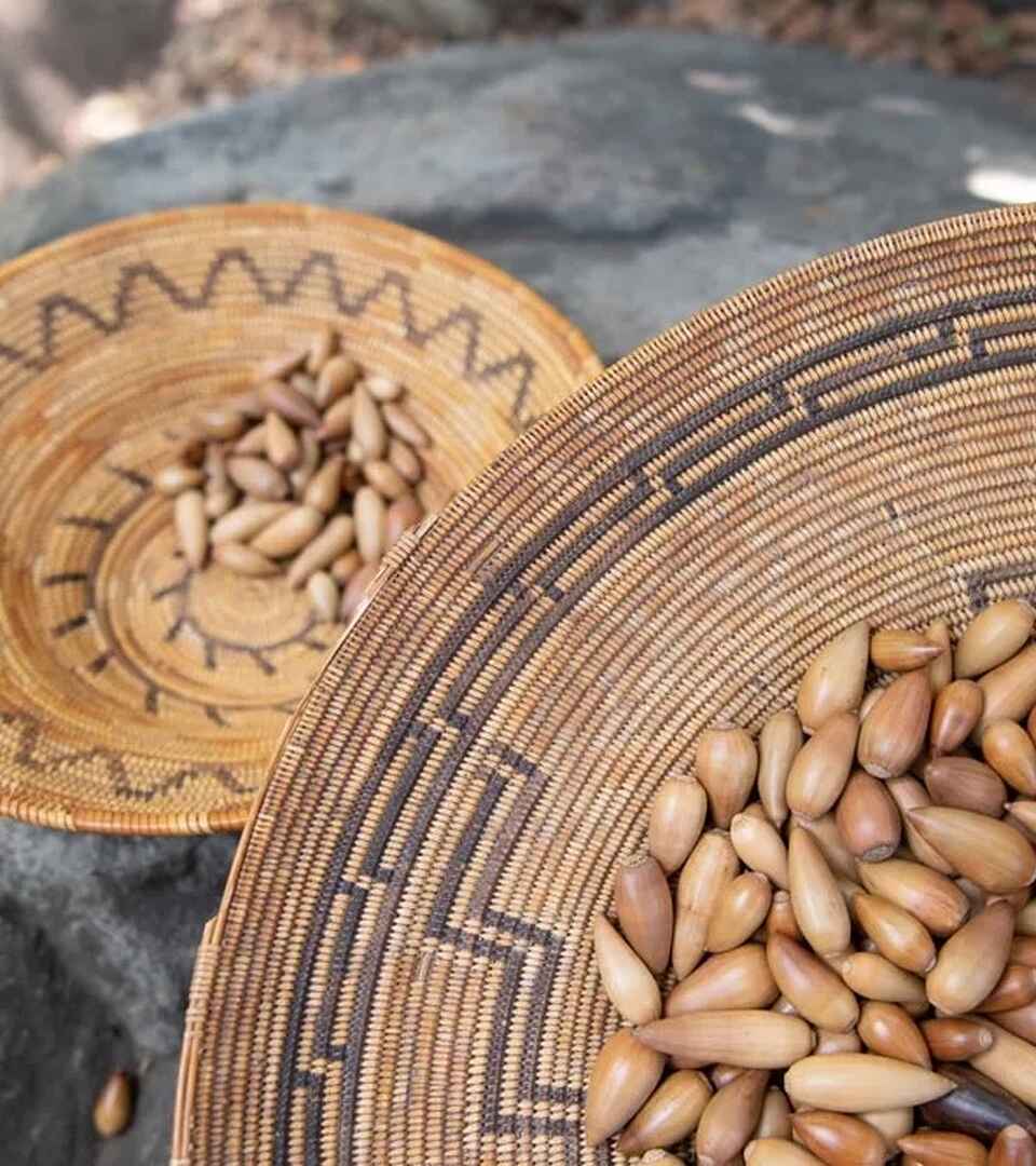 Peanuts in traditional woven baskets with decorative patterns