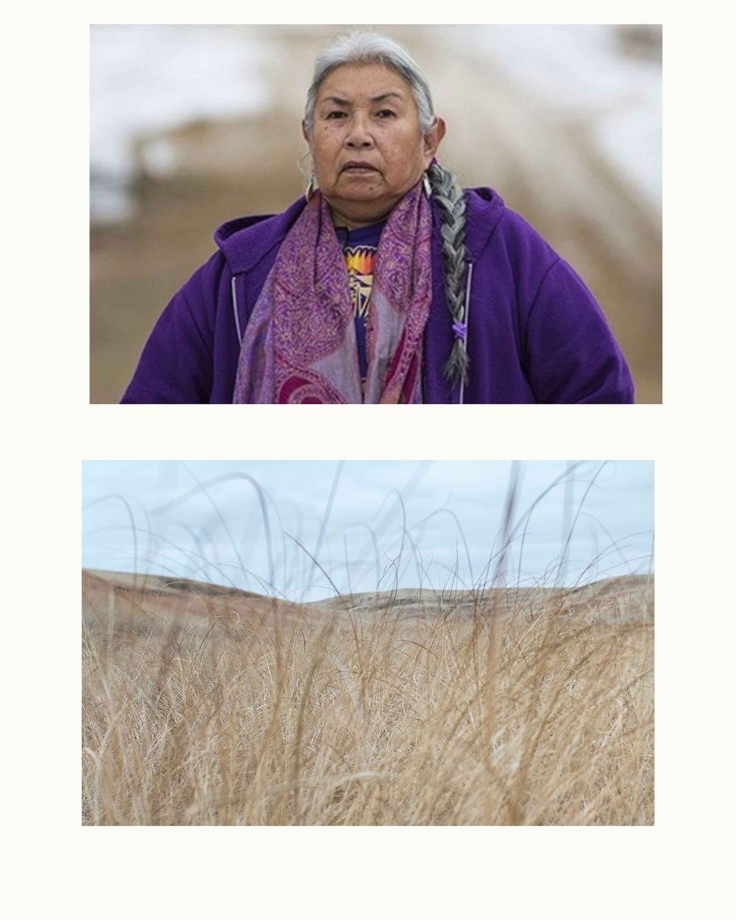 Kelsey Ducheneaux, a Native American woman wearing a purple jacket and braided hair, stands in a windswept prairie landscape.